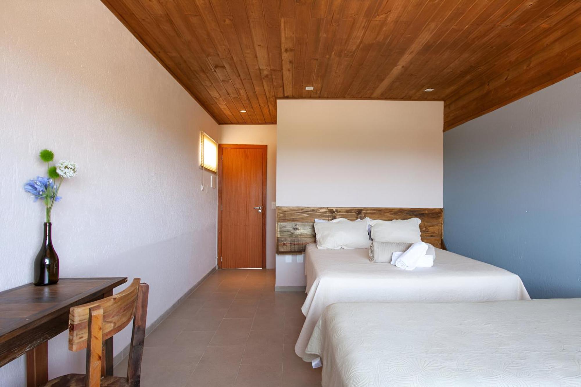 Quarto Quádruplo com Vista do Mar.